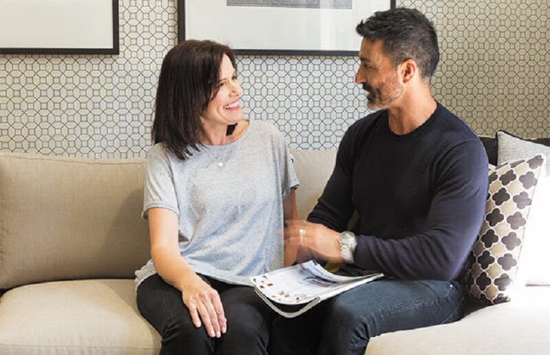 couple discussing a new interior style in an orbit home